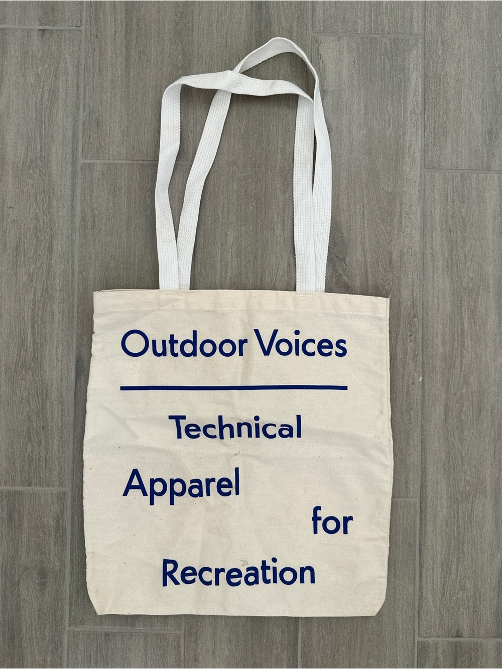 Outdoor Voices Cream Canvas Tote with Blue Logo Text